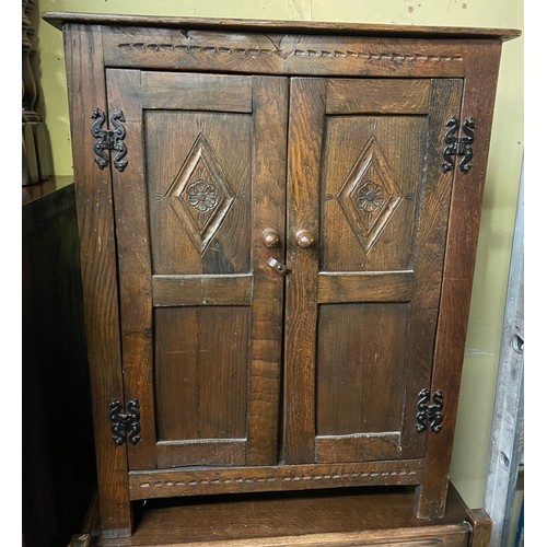 260 - REPRODUCTION OAK CARVED TWO DOOR CUPBOARD