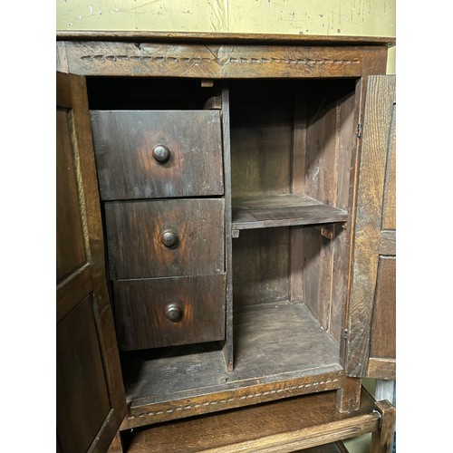 260 - REPRODUCTION OAK CARVED TWO DOOR CUPBOARD