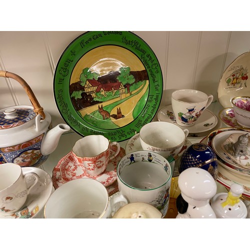 414 - SHELF OF NURSERY CHILDRENS POTTERY AND PORCELAIN, BUNNYKINS, NODDY, SNOOPY AND OTHERS