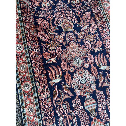 227 - 20TH CENTURY SILKY PATTERN CARPET DECORATED WITH BIRDS AND FOLIAGE