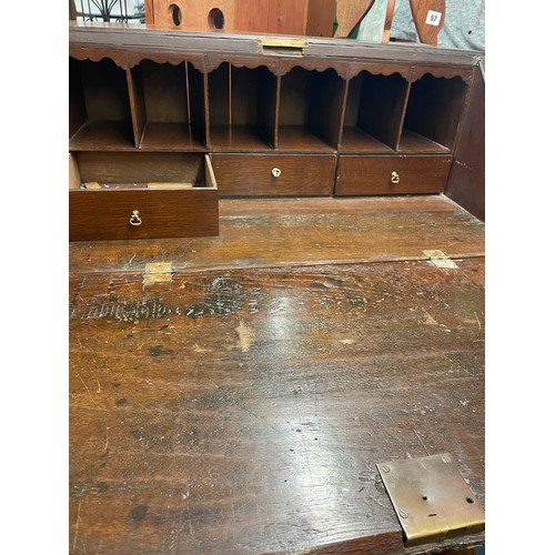 60 - MAHOGANY CROSS BANDED AND CHEQUER STRUNG BUREAU ON CARVED CABRIOLE LEGS