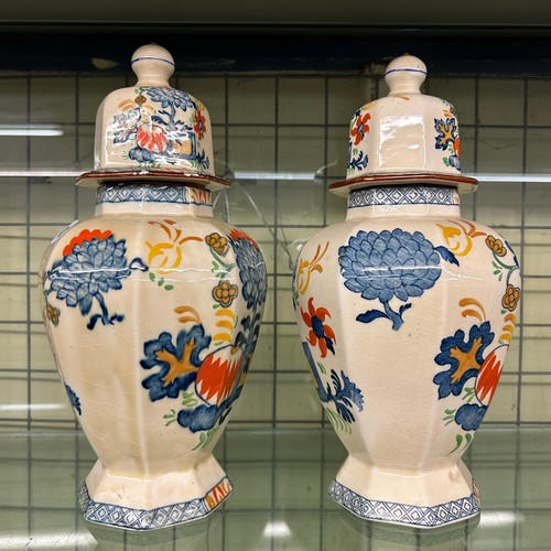 432 - PAIR OF REPRODUCTIONS MASONS STYLE OCTAGONAL PANELLED JARS AND COVERS