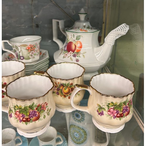 447 - SHELF OF FRUIT PATTERN TABLEWARES