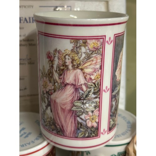 479 - CAPODIMONTE FIGURE ROSE FAIRY, SET OF THE FLOWER FAIRY CERAMIC MUGS, BORDER BONE CHINA FAIRY PLATES