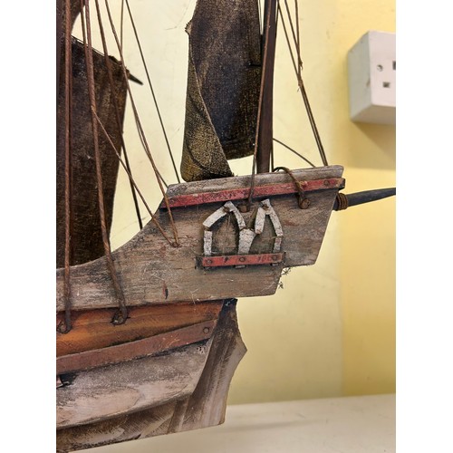 501 - TWO WOODEN CARVED GALLEON MODELS ON STANDS