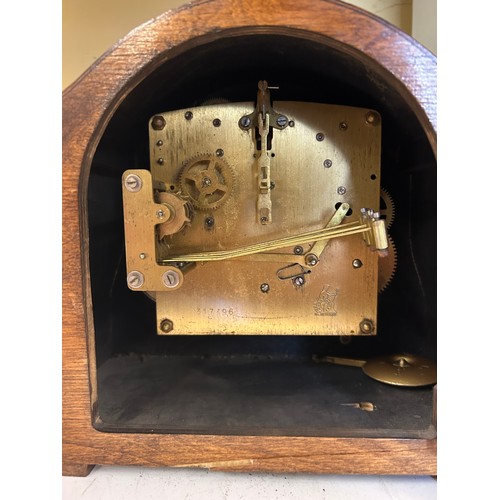 507 - WALNUT MANTLE CLOCK AND OAK CASED EIGHT DAY CLOCK AND ONE OTHER