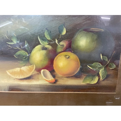 347 - EARLY 20TH CENTURY OILS ON BOARD STILL LIFE OF APPLES AND PEARS MONOGRAMMED KAV? FRAMED AND GLAZED