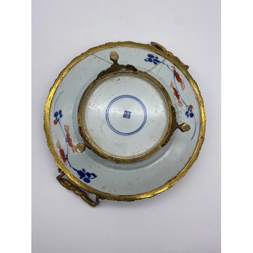 633 - CHINESE POTTERY PLATE CONVERTED TO SERVING TRAY WITH GILT METAL TWIN HANDLED SERPENT DESIGN A/F