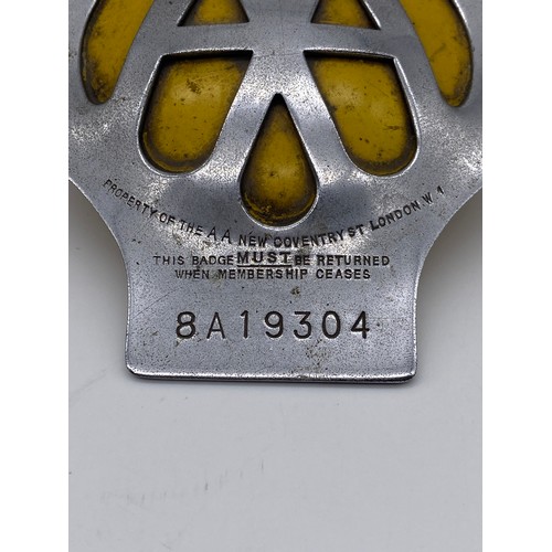 587 - VINTAGE AA GRILLE BADGE