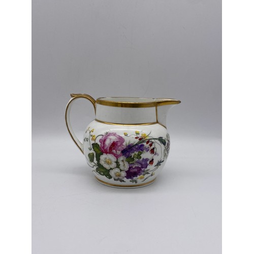 439 - UNMARKED 19TH C PORCELAIN JUG HAND PAINTED WITH FLORAL SPRAYS AND GILT DETAIL