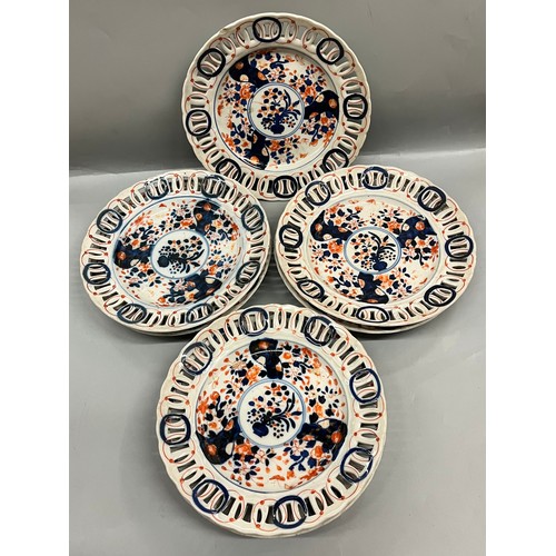 618 - SEVEN IMARI PATTERN PLATES WITH PIERCED BORDERS