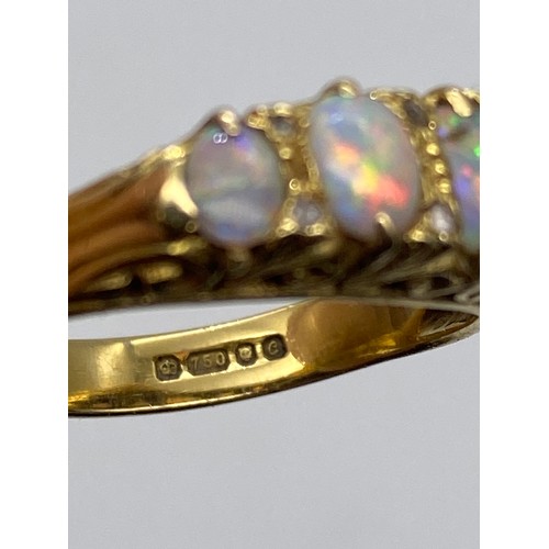 671 - STAMPED 750 YELLOW GOLD FIVE STONE OPAL CHANNEL SET RING SIZE O 6.4G APPROX (PLUS 3 SPARE OPAL STONE... 