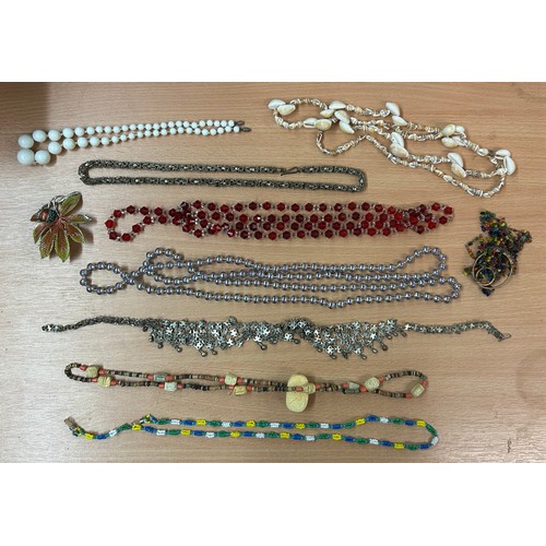 593 - SELECTION OF COSTUME JEWELLERY, BEADED NECKLACES AND ENAMELLED BANGLES