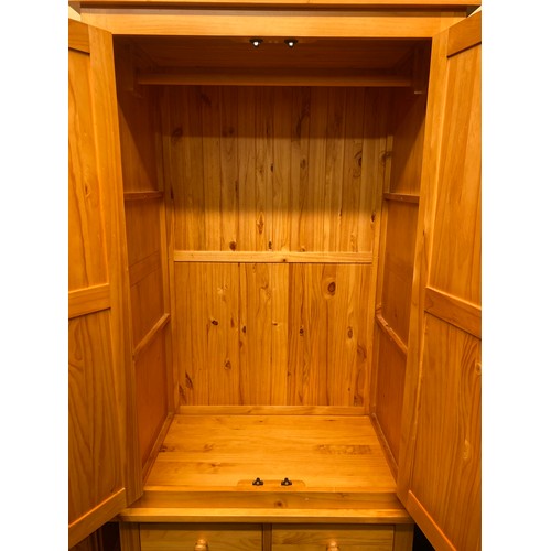 1A - PINE PANELLED TWO DOOR WARDROBE WITH DRAWER BASE