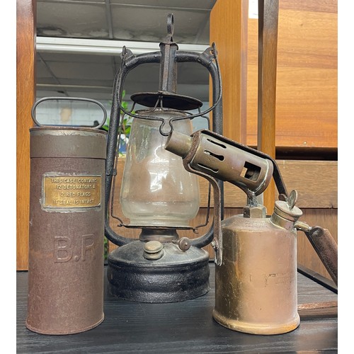 427 - VINTAGE HURRICANE LAMP, PRIMUS BURNER, AND BP DETONATOR AND FLAG CANISTER