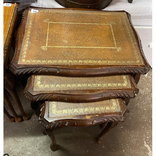 59 - NEST OF GLASS TOPPED LEATHER INSET TABLES