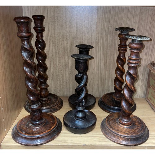 416 - THREE PAIRS OF OAK BARLEY TWIST CANDLESTICKS