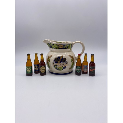 571 - M&B WADE WATER JUG AND SELECTION OF MINIATURE ALE BOTTLES