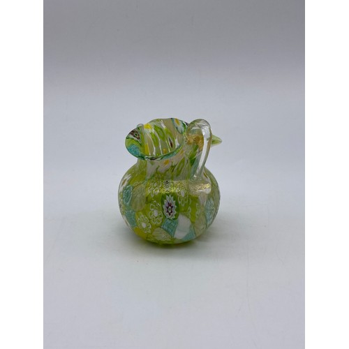 623 - MILLEFIORI DAISY PATTERN GREEN GLASS MINIATURE JUG