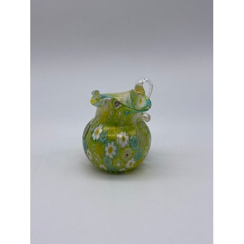 623 - MILLEFIORI DAISY PATTERN GREEN GLASS MINIATURE JUG