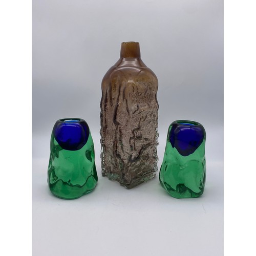 587 - MDINA BARK EFFECT SQUARE BOTTLE VASE AND A PAIR OF GLOBULAR FORM CANDLE HOLDERS