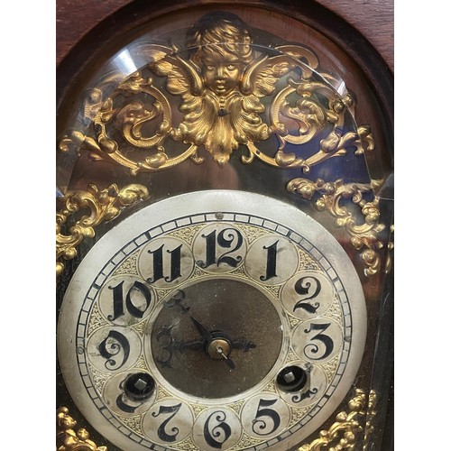 439 - 19TH CENTURY WALNUT ARCHITECTURAL CASED MANTEL CLOCK