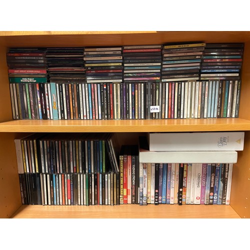 437B - TWO SHELVES OF VARIOUS MUSIC CDS, SOME DVDS AND BOX SETS