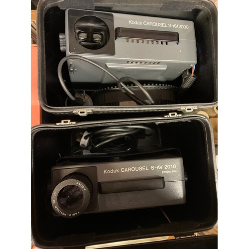 347 - TWO CASED KODAK CAROUSEL S-AV 2010 PROJECTORS WITH BOXED CAROUSELS