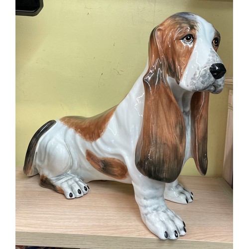 581 - ITALIAN POTTERY MODEL OF A SEATED BASSET HOUND