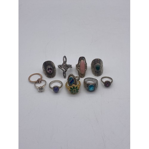 549 - SELECTION OF SILVER AND WHITE METAL DRESS RINGS, SOME WITH CABOCHON STONES