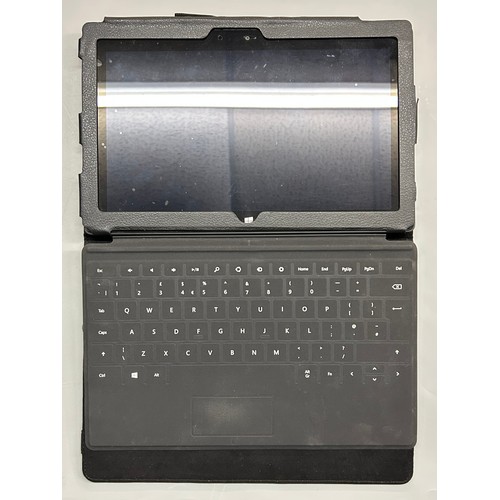 543 - TWO APPLE IPADS, AND WINDOWS TABLET IN KEYBOARD CASE