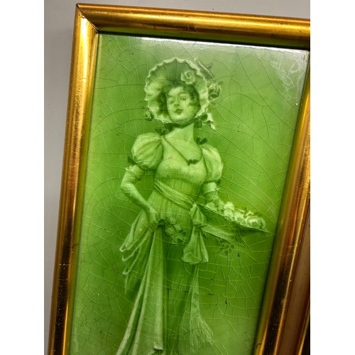 544 - PAIR OF LATE VICTORIAN GREEN CERAMIC TILE PANELS OF FEMALES FRAMED