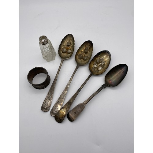 556 - GEORGIAN SILVER BERRY SPOONS AND AN IRISH SILVER SPOON AND NAPKIN RING