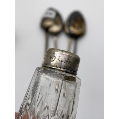 556 - GEORGIAN SILVER BERRY SPOONS AND AN IRISH SILVER SPOON AND NAPKIN RING