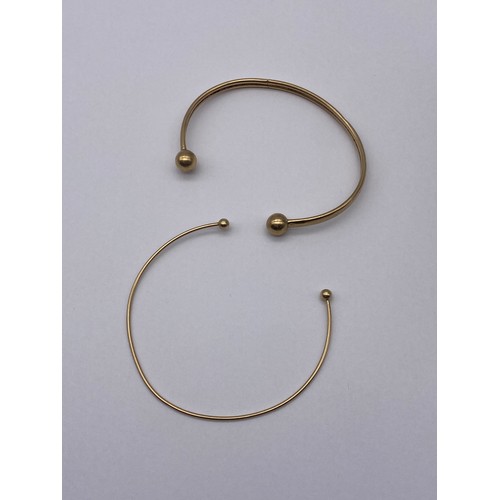 445 - TWO 9CT TORQUE BANGLES 7.1G OVERALL