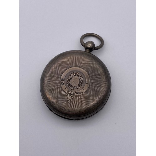 551 - BIRMINGHAM SILVER CASED POCKET WATCH WITH KEY