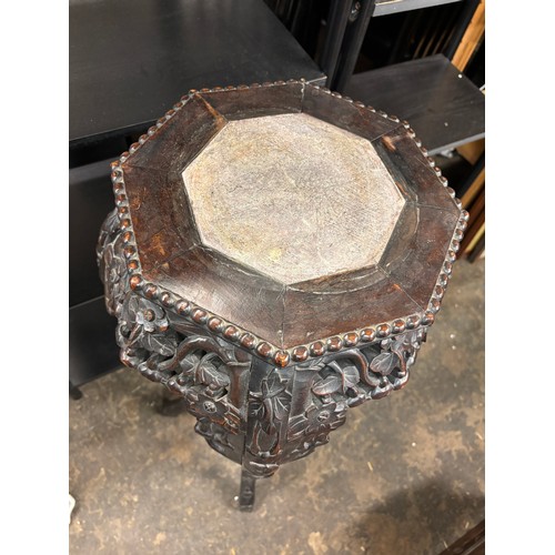 135 - ORIENTAL HARDWOOD CARVED OCTAGONAL MARBLE INSET JARDINIERE STAND