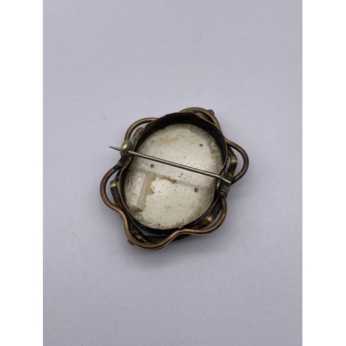 457 - BASE METAL MOUNTED CARVED OVAL CAMEO BROOCH, TURQUOISE CERAMIC BROOCH AND A SMALL CITRINE BAR BROOCH
