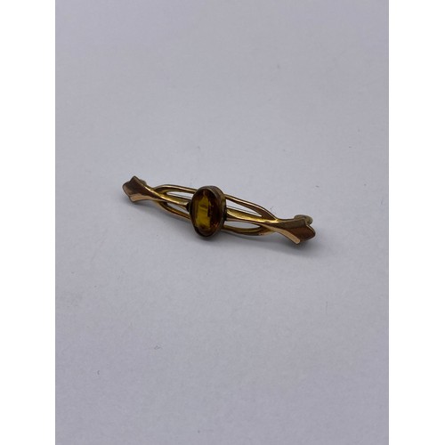 457 - BASE METAL MOUNTED CARVED OVAL CAMEO BROOCH, TURQUOISE CERAMIC BROOCH AND A SMALL CITRINE BAR BROOCH