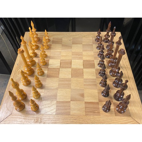 106 - OAK CHEQUER INLAID CHESS TABLE WITH CHESS MEN