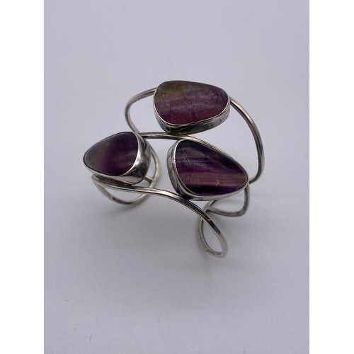 459 - MEXICAN SILVER AND AMETHYST CUFF BANGLE BY CITLAL CASTILLO AND A SILVER WIREWORK STONE SET CUFF BANG... 