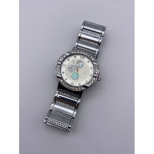456 - STAINLESS STEEL ICE STAR 4499 OVERSIZED WRIST WATCH WITH DIAMANTE BEZEL AND LINKS