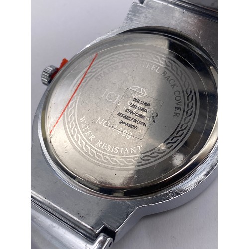 456 - STAINLESS STEEL ICE STAR 4499 OVERSIZED WRIST WATCH WITH DIAMANTE BEZEL AND LINKS