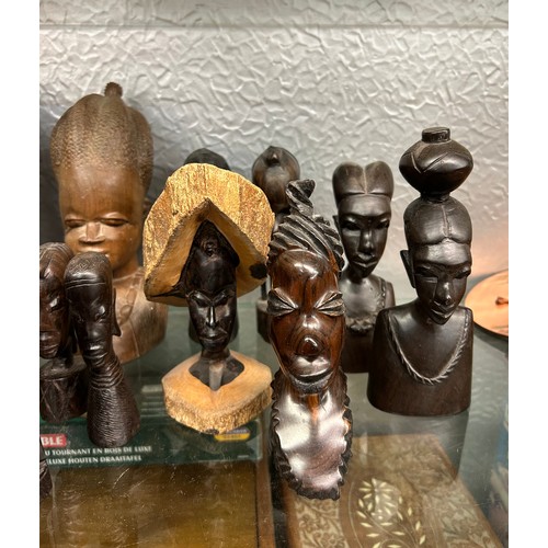 219 - SELECTION OF CARVED HARDWOOD AFRICAN BUSTS OF MALE AND FEMALE