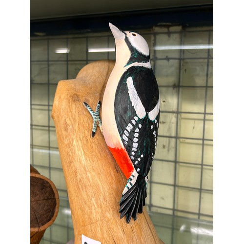 239 - CARVED AND PAINTED MODELS OF A WOODPECKER, FALCON AND ROBIN