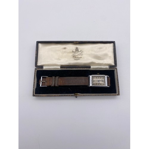 563 - CASED VINTAGE 1920S/30S WRISTWATCH ON LEATHER STRAP WINDER A/F