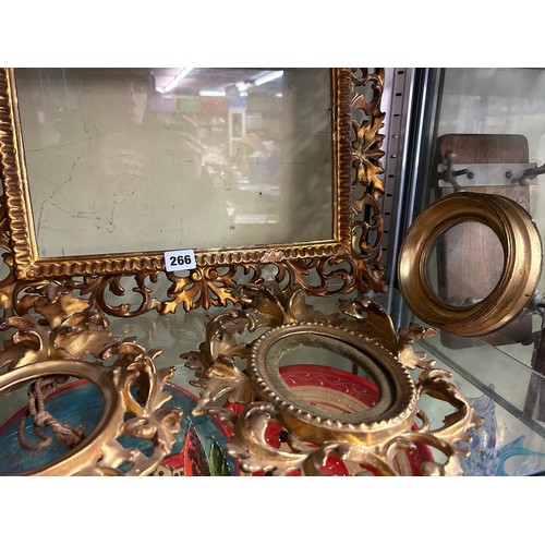 266 - SHELF OF ORNATE GILT SCROLLED PHOTOGRAPH FRAMES