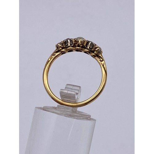 524 - 18CT GOLD DIAMOND AND PEARL CHANNEL SET RING 2.9G APPROX