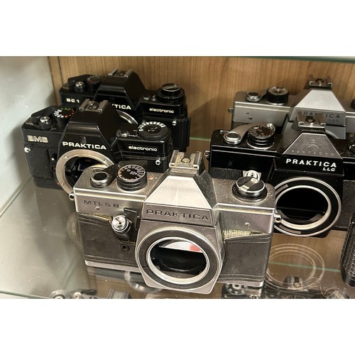 362 - TWO SHELVES OF ZENIT AND PRAKTICA 35M CAMERA BODIES