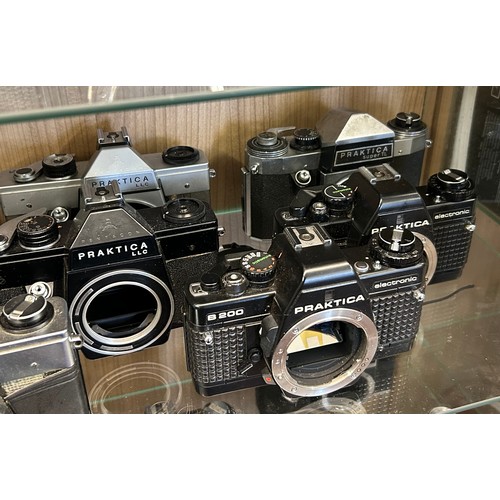 362 - TWO SHELVES OF ZENIT AND PRAKTICA 35M CAMERA BODIES